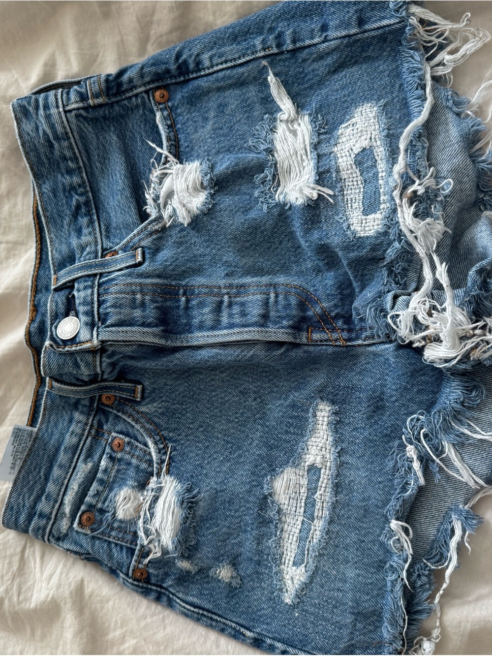 Levi’s Distressed Blue Denim Cutoff Shorts 501